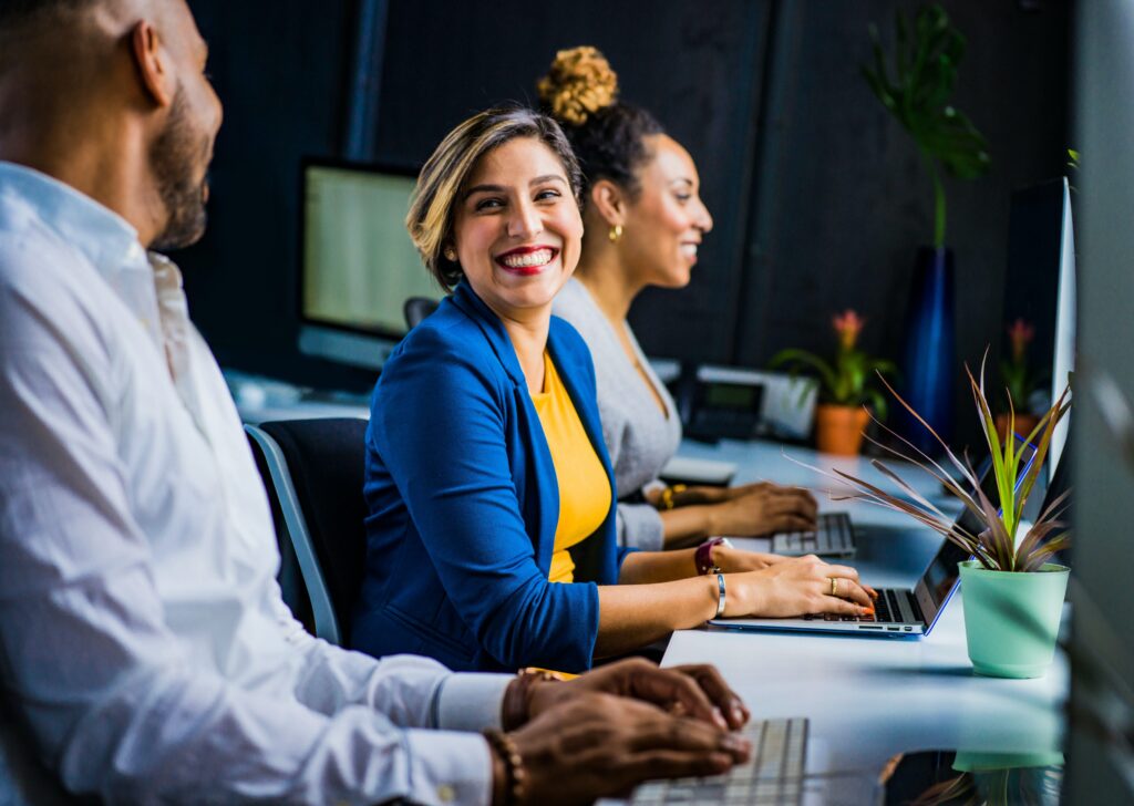 woman in office smiling